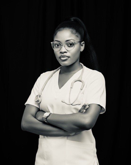 Blessing Kimase smiling in professional headshot, healthcare operations professional